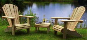 Photo of relaxation by lake with beer